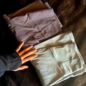 Two pairs of ATHLETA flare leggings